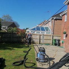 Gutter cleaning at Cardiff using vacuum and poles